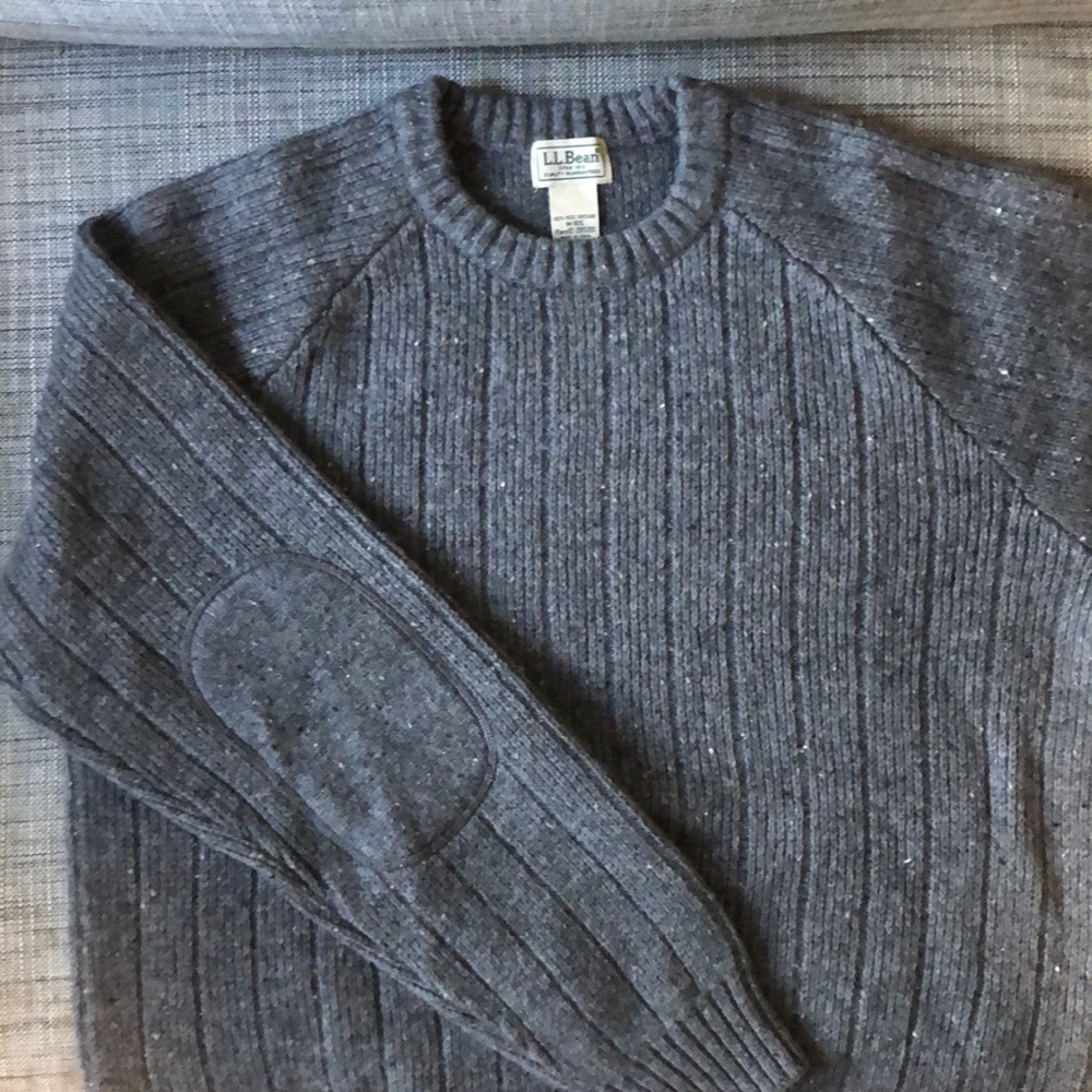 Heavy wool sweater with reinforced elbows.
